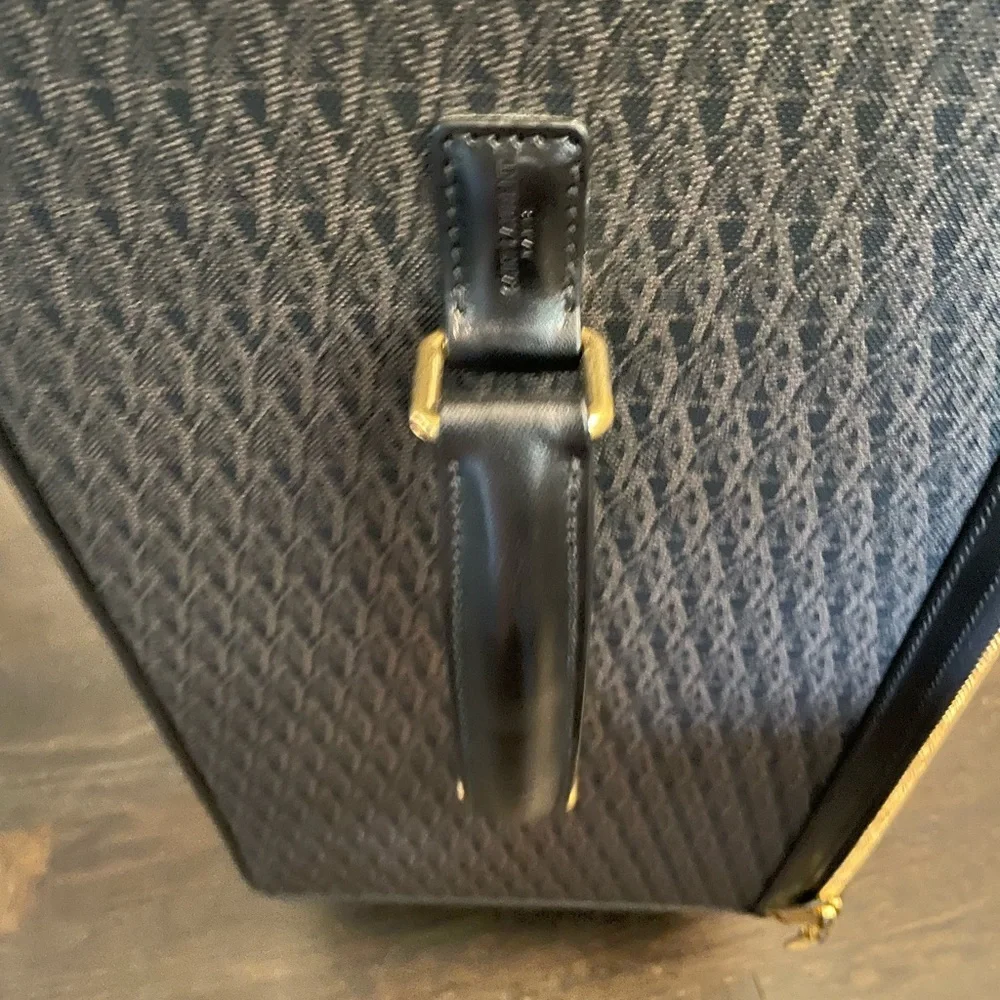YSL Saint Laurent paris travel luggage trolley 360 wheels travel in style Italy